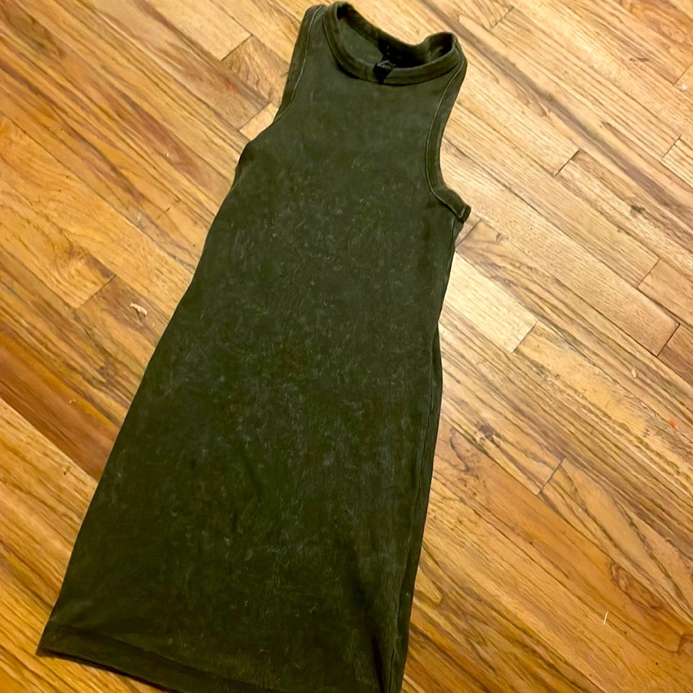 A dark olive green fitted dress